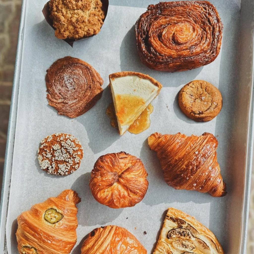 Box of kouign-amann and seasonal pastries from Birch Bakery, showcasing Middle-Eastern flavours in Dubai’s gourmet bakery scene.